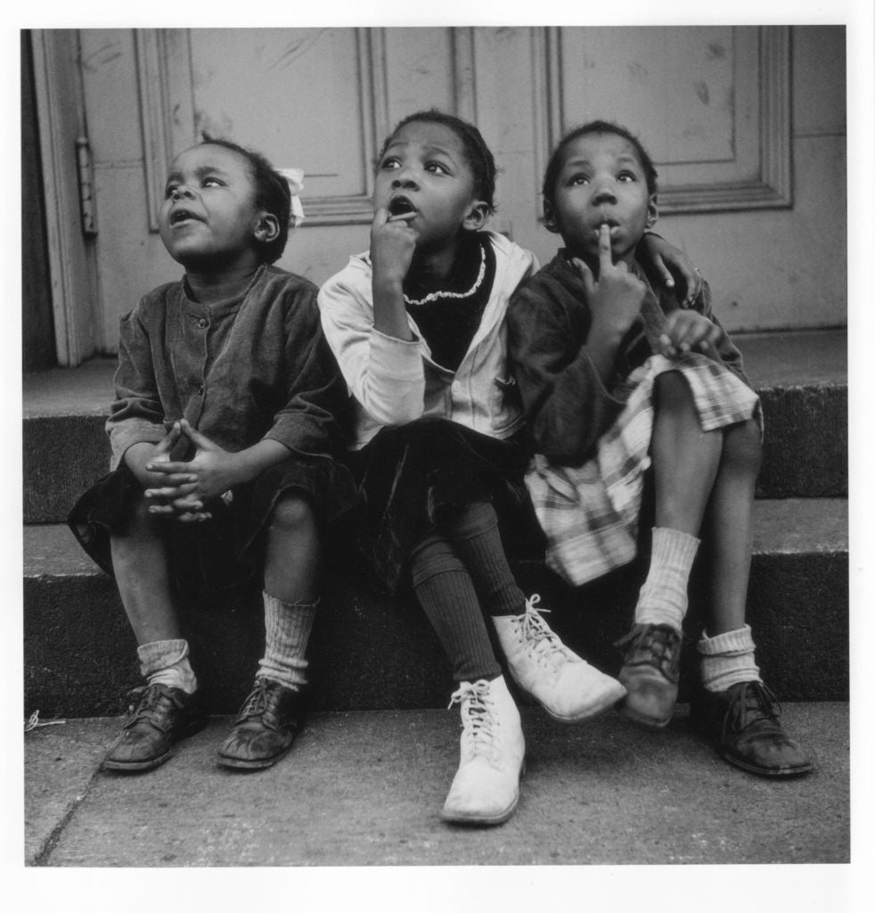 three little girls sitting down