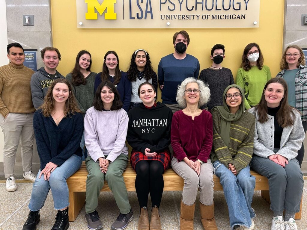 CDL Team standing in front of the LSA Psychology sign
