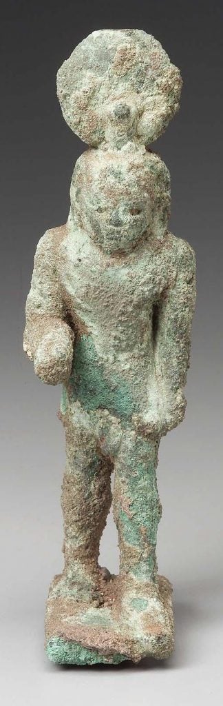 Figurine of a striding god 