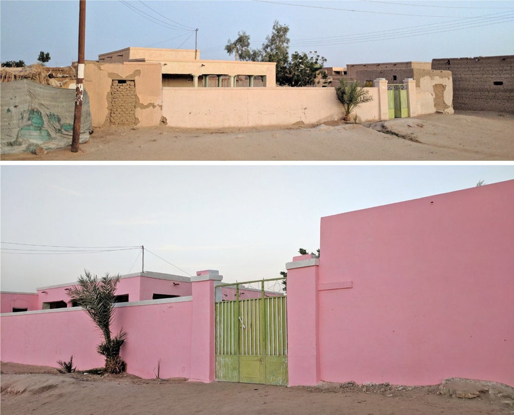 two stucco walls, one painted pink