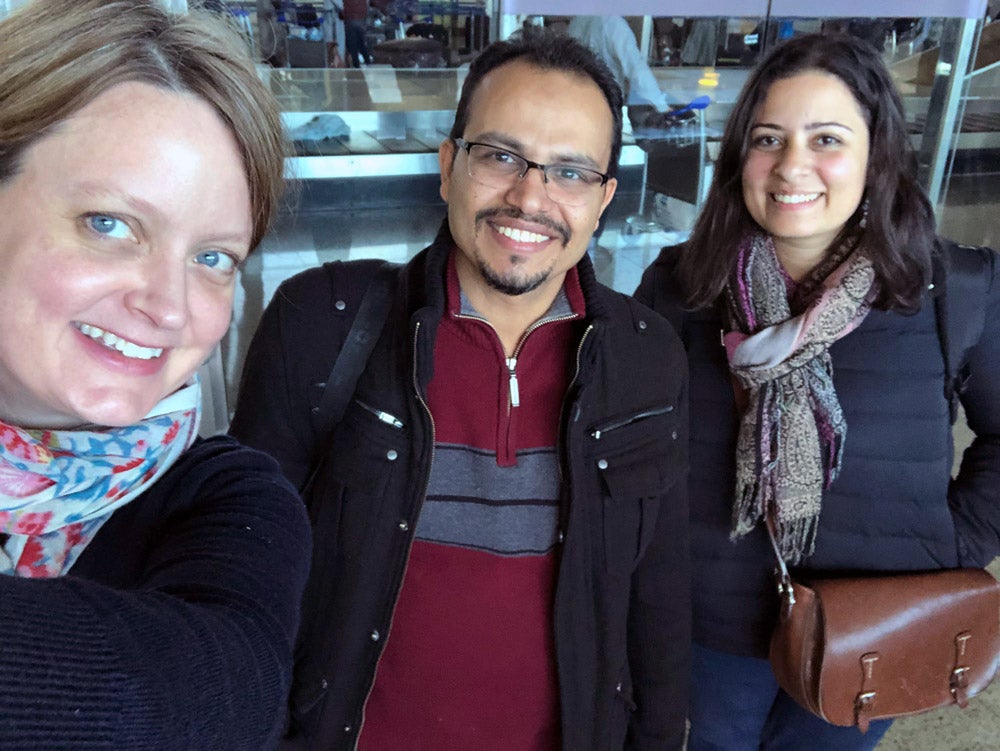 Selfie of three people at airport