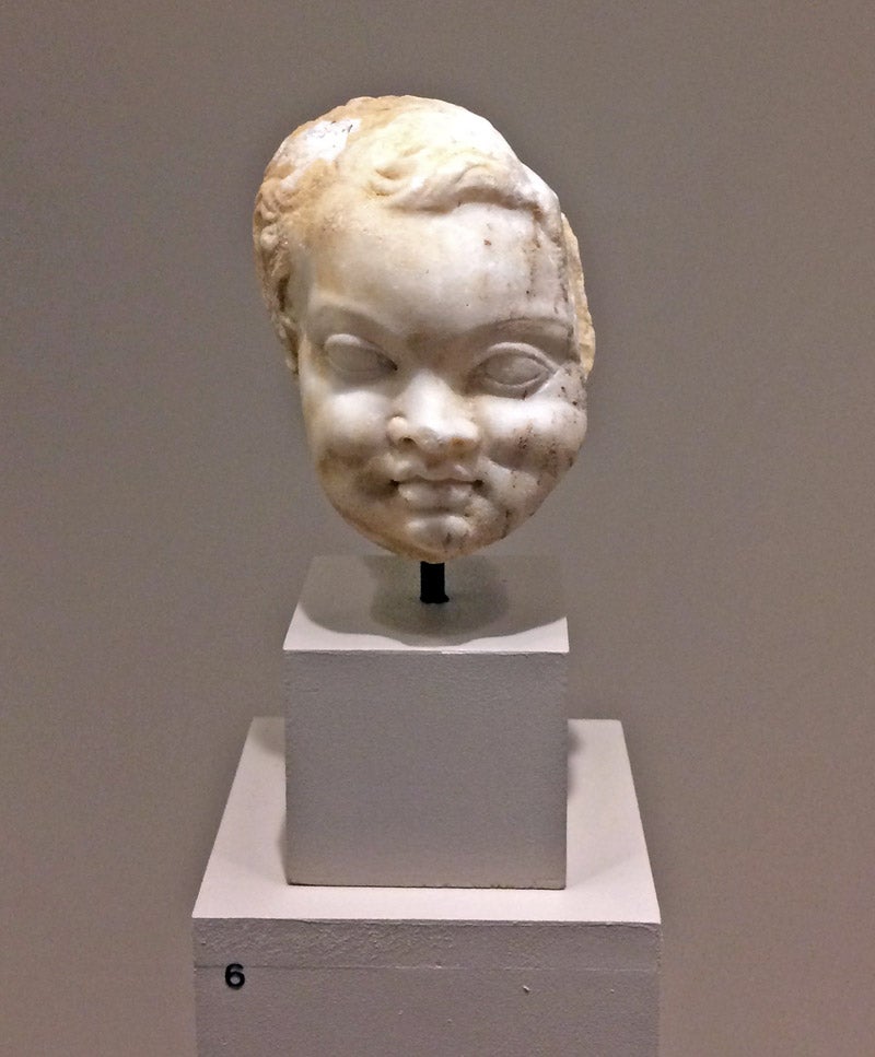 Marble head of a little boy.