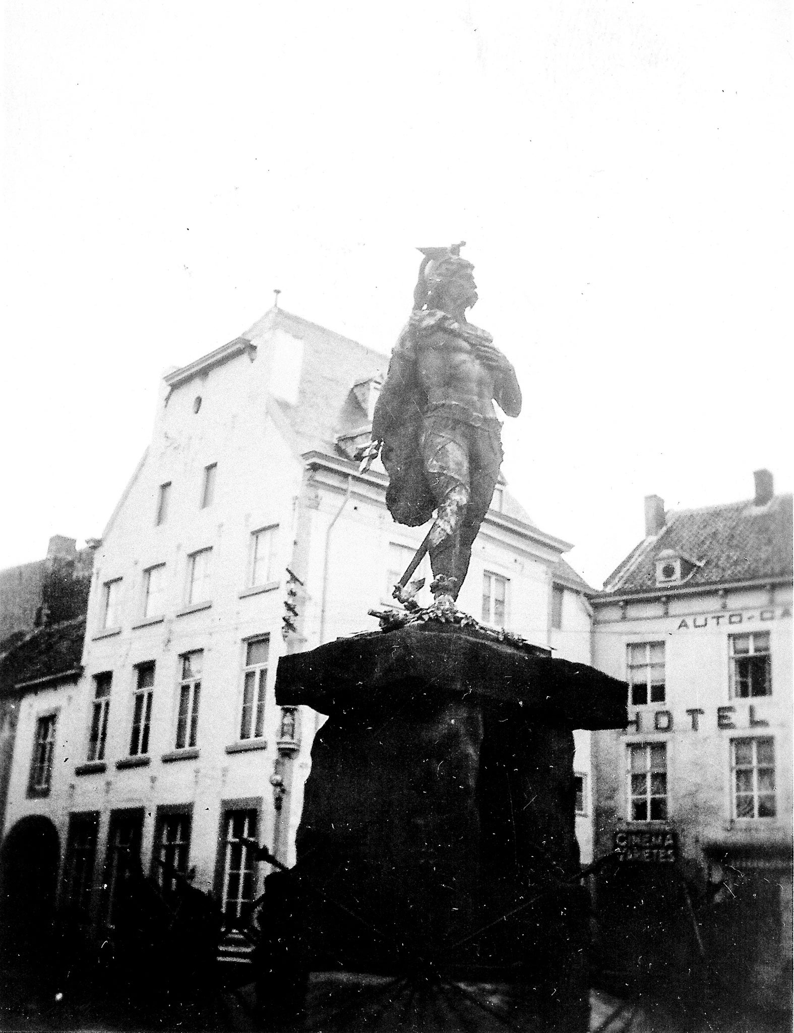 black and white photo of a statue