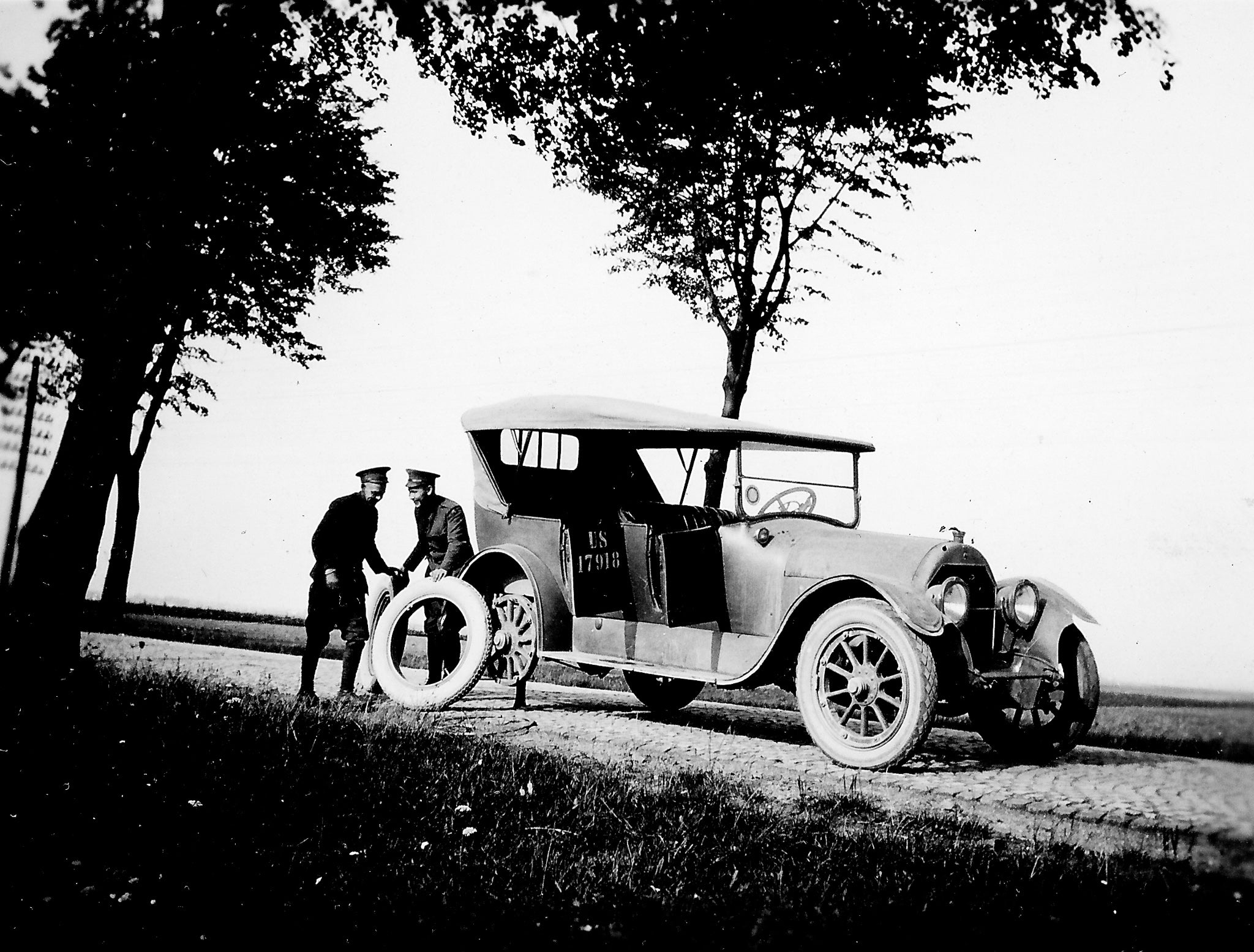 black and white photo of a 1920s car