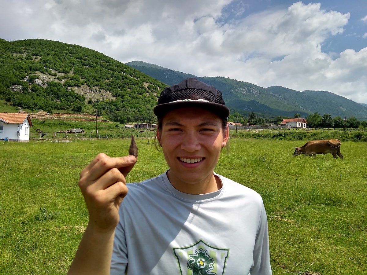 Trevor holding a lithic tool.