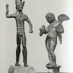 Two statuettes: warrior and Cupid.