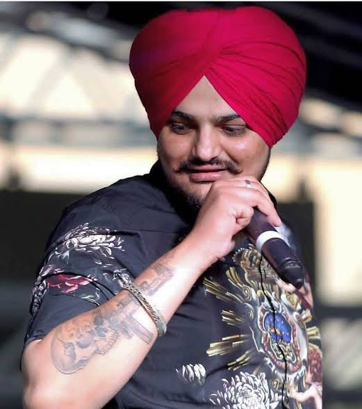 To keep their son 'close' to them, Sidhu Moosewala's parents get singer's  tattoo inked : The Tribune India